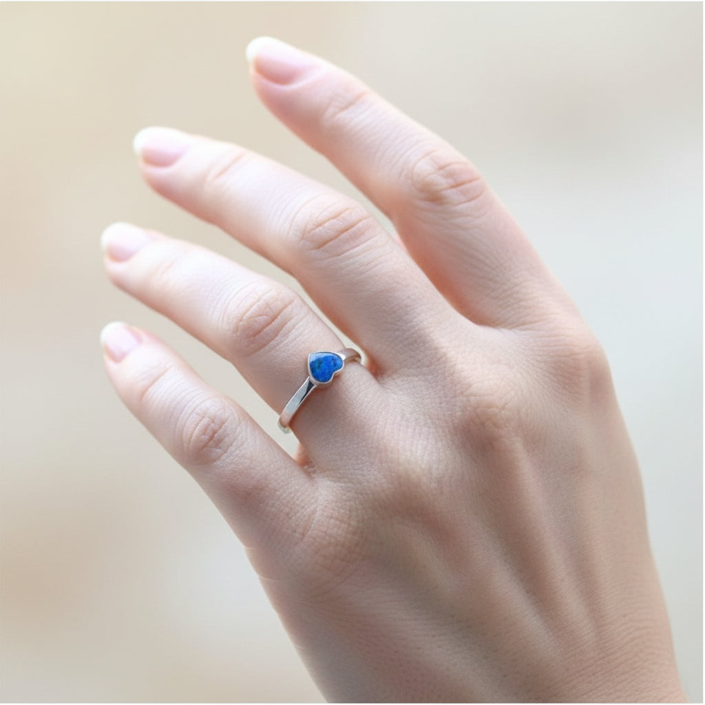Side view of a handcrafted 6mm heart memorial ring, preserving ashes in a timeless design.