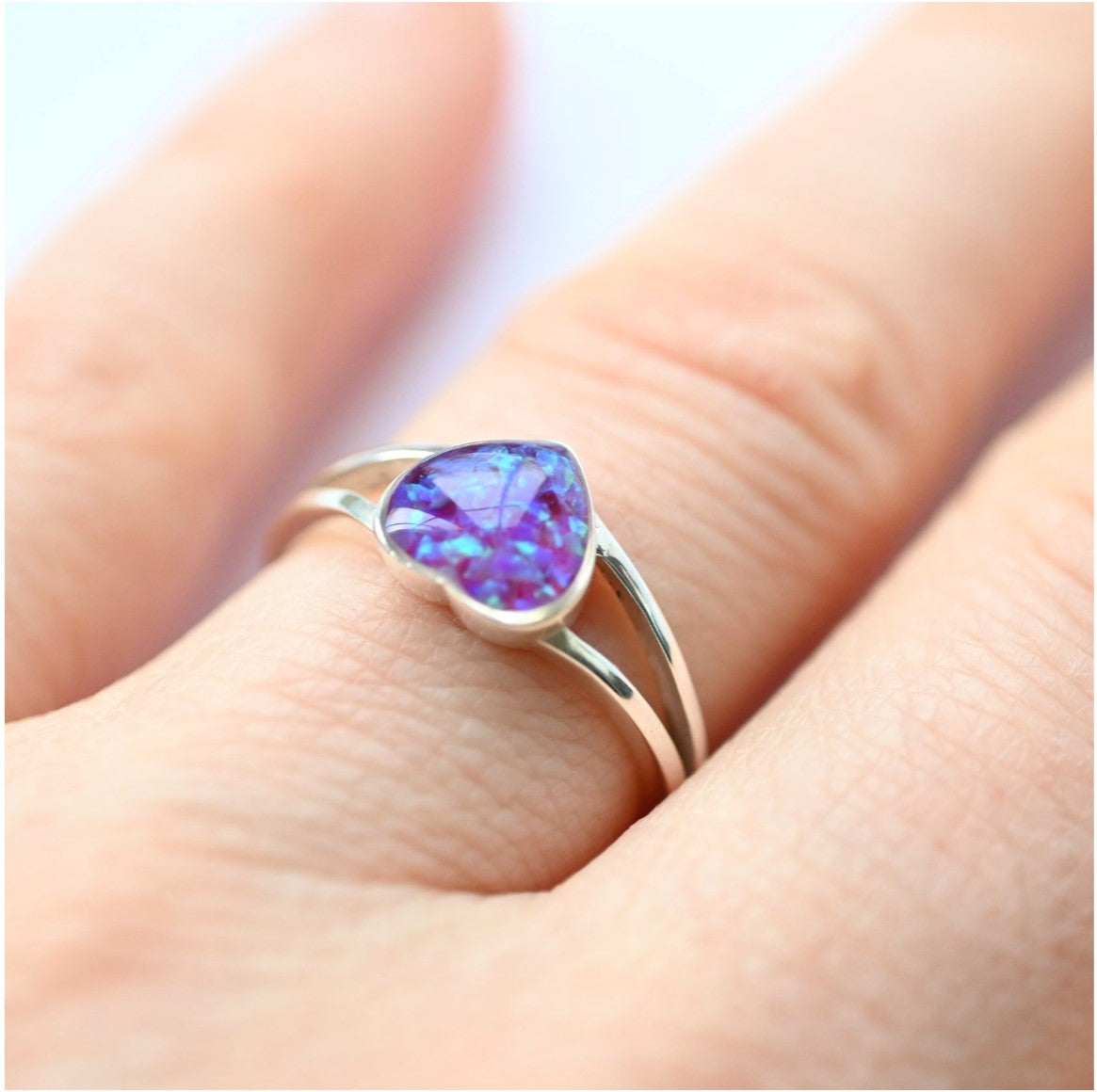 Heart-shaped memorial ring in 9K gold or sterling silver, beautifully crafted to hold ashes or personal items.