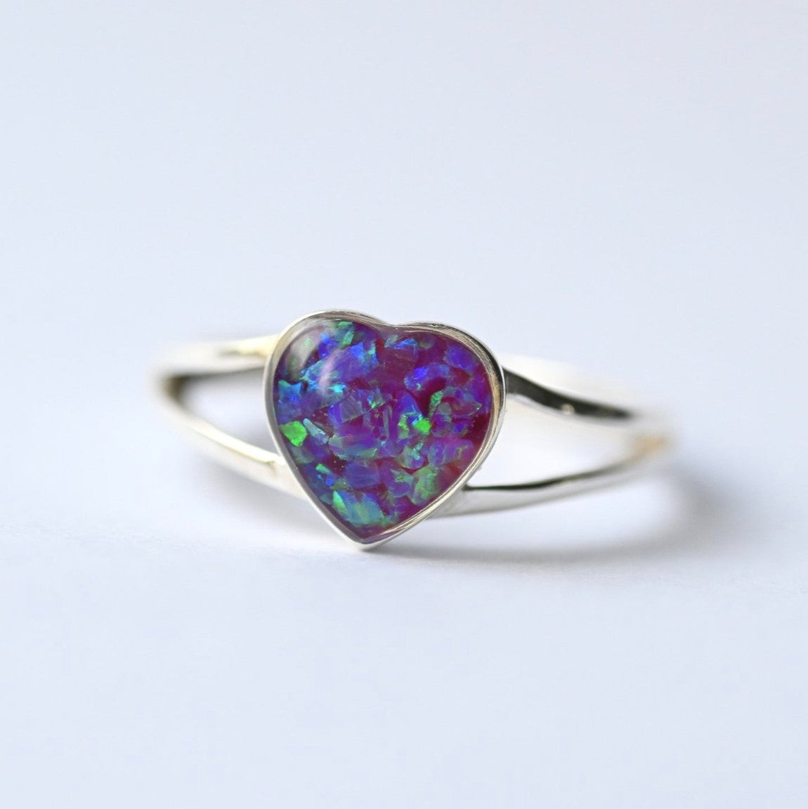 Side view of a heart-shaped ring in 9K gold, with a subtle yet meaningful design for a cherished keepsake.