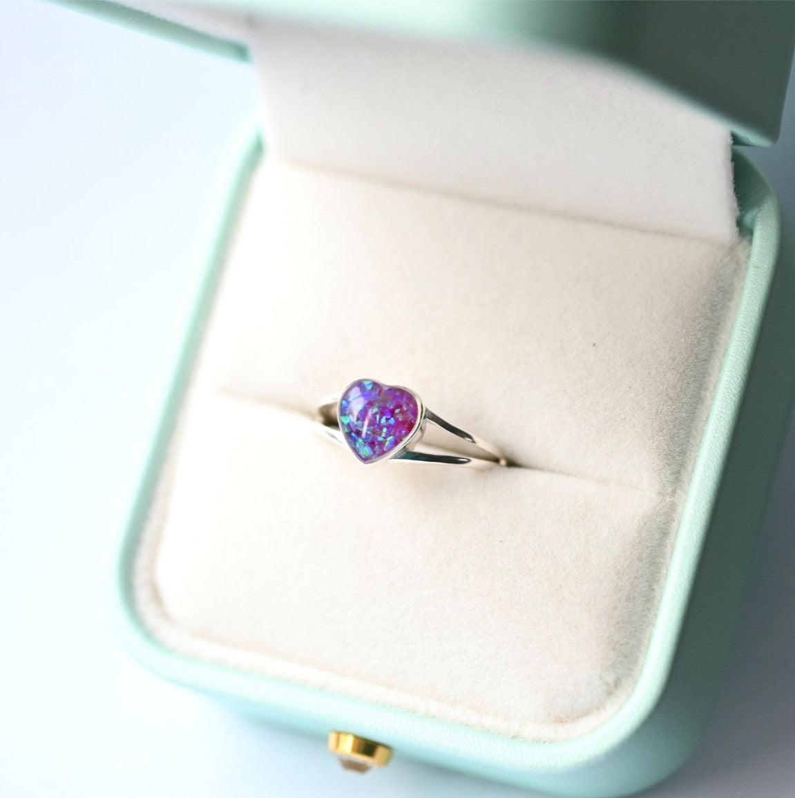 Elegant heart-shaped memorial ring in sterling silver, perfect for preserving loved ones' memories.