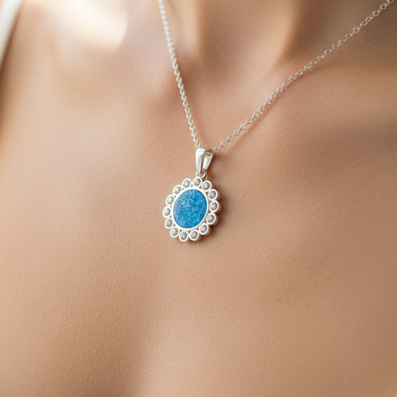 Necklace with a blue pendant on a mannequin