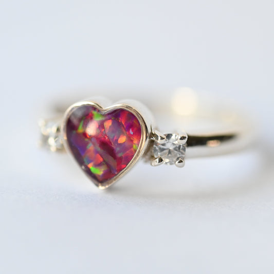 Handcrafted heart double gem ring with cremation ashes, a unique memorial jewellery piece, designed and made in the UK.