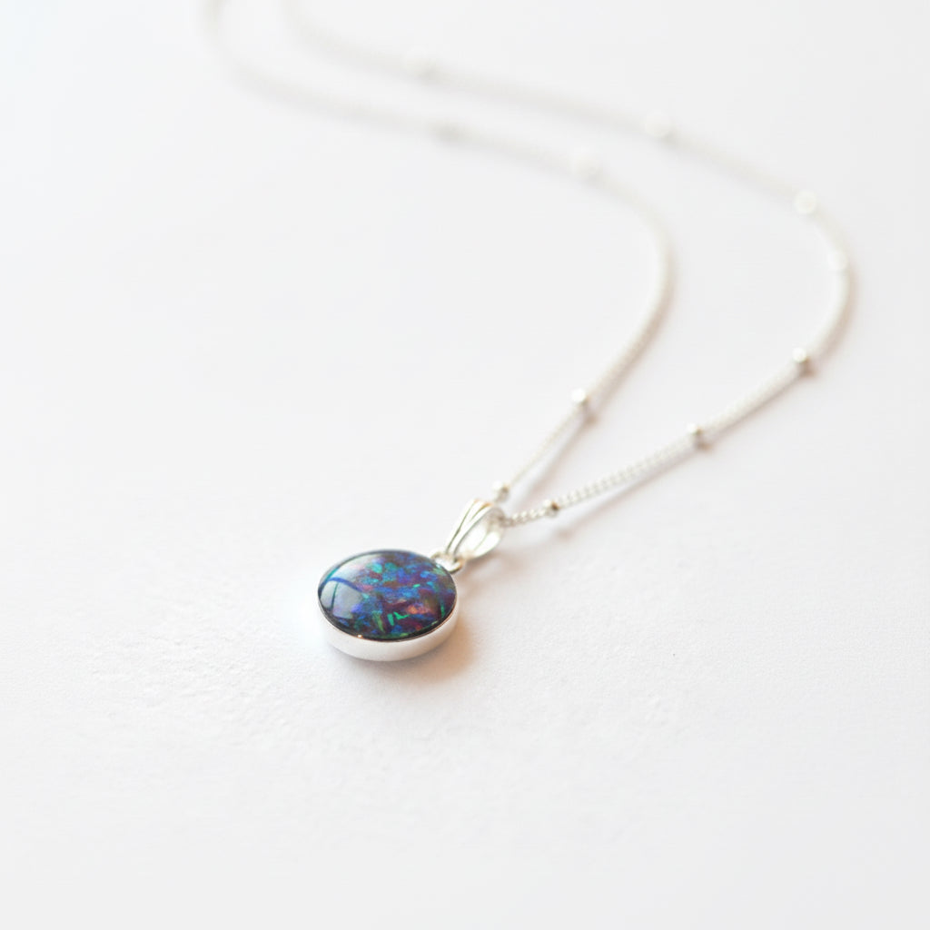 Elegant Sterling Silver Memorial Necklace with Circle Pendant – A beautiful 10mm or 12mm sterling silver pendant necklace with custom ashes, hair, or opal flakes inside, preserving memories.