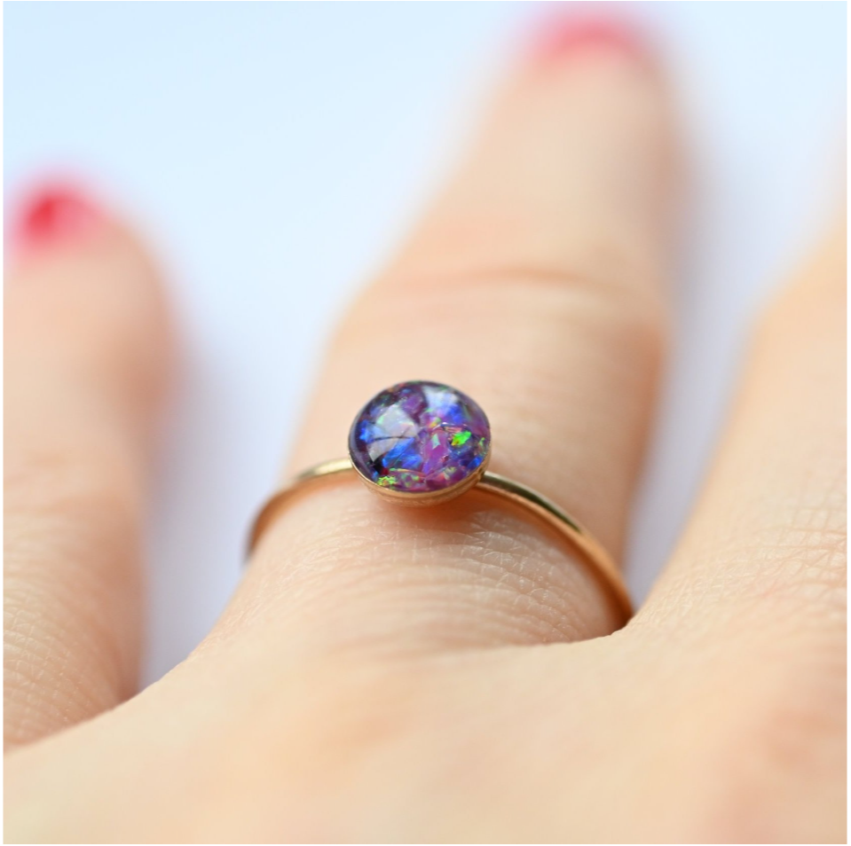 Handcrafted 6mm gold-filled stacking ring featuring iridescent opal flakes, a beautiful UK-made piece for everyday wear or remembrance.
