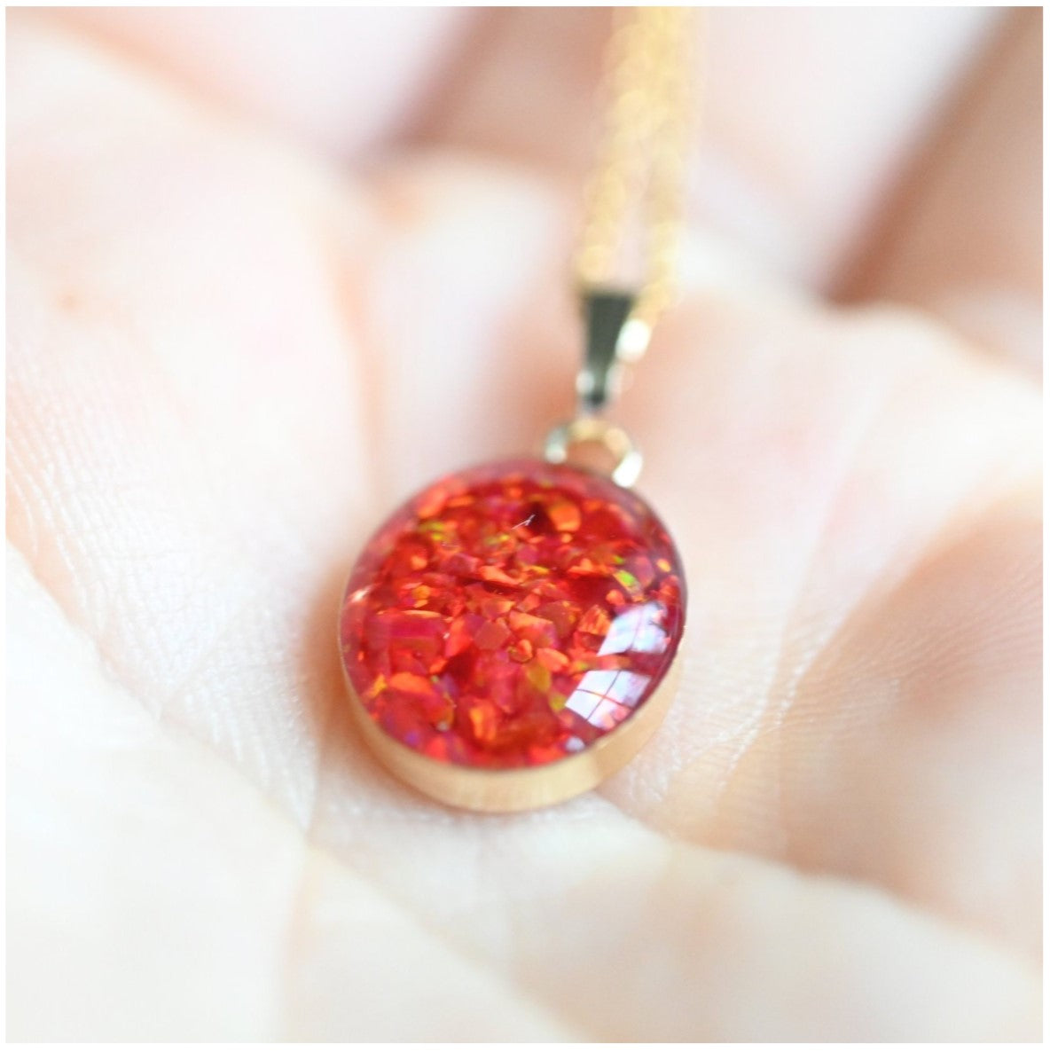 Back View of Gold-Filled Memorial Necklace with Ashes or Hair Keepsake – A view from the back of the memorial pendant, showcasing the gold-filled setting and keepsake inside.
