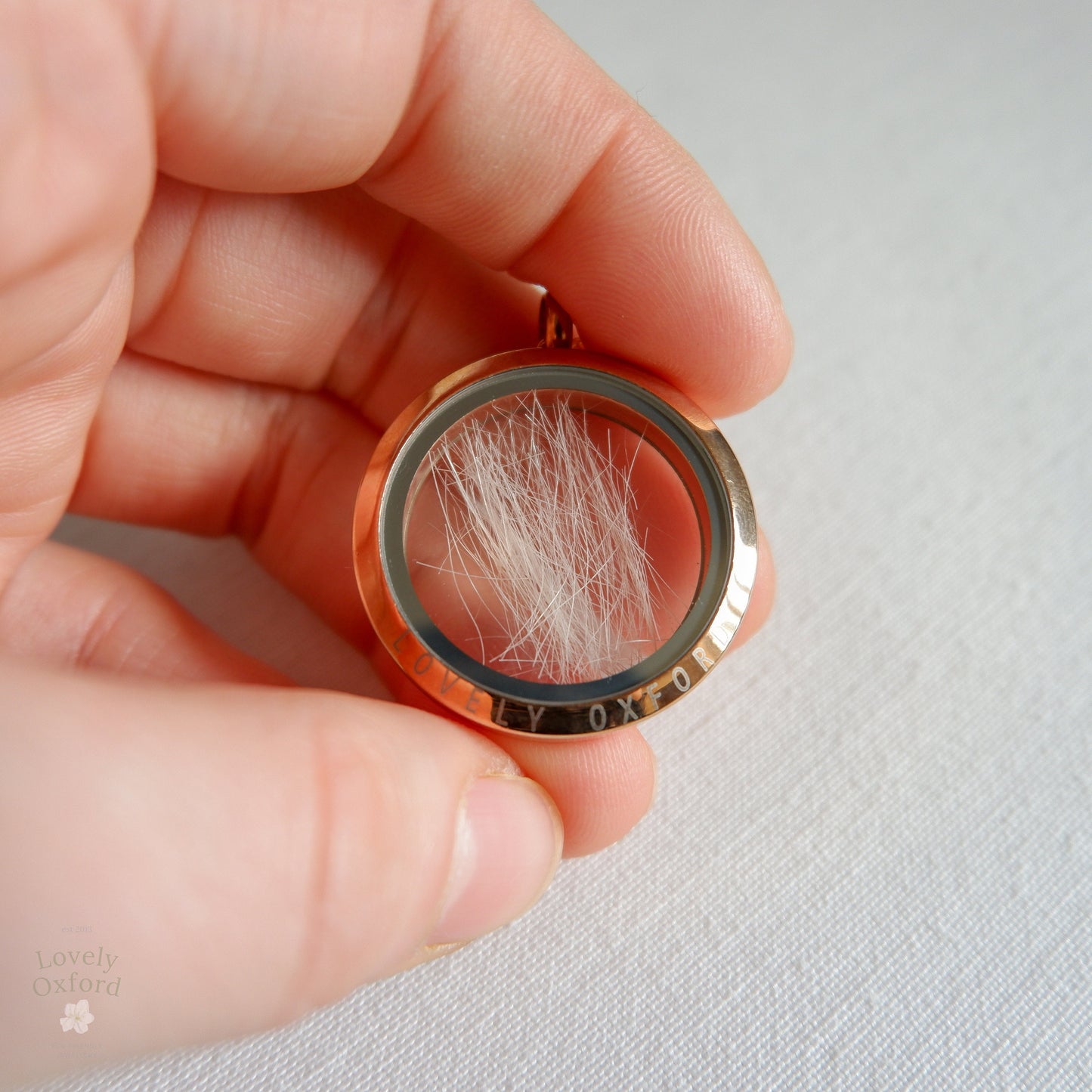 Pet Fur Glass Locket Necklace with Cat Hair Keepsake – A personalised glass locket necklace containing a lock of cat fur, symbolising a cherished memory.