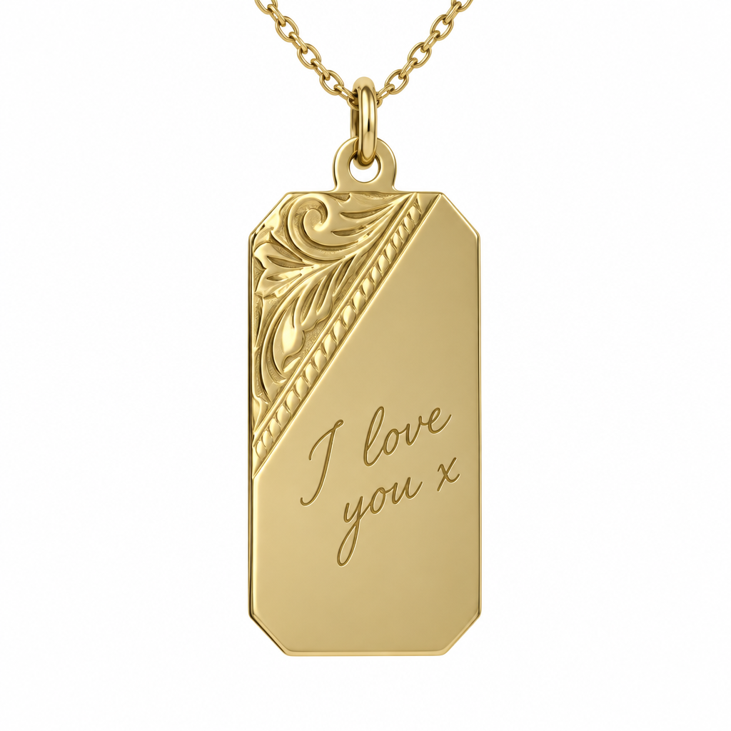 Illustrative handwriting engraving on 9ct yellow gold floral-corner rectangular pendant on matching chain against white