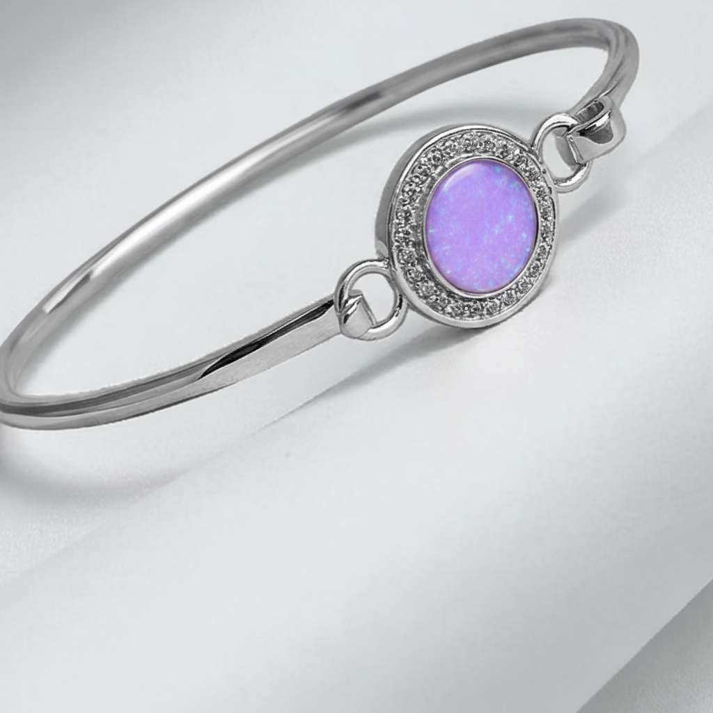 Halo CZ hook clasp silver bangle with lavender purple opal resin in oval bezel, white background