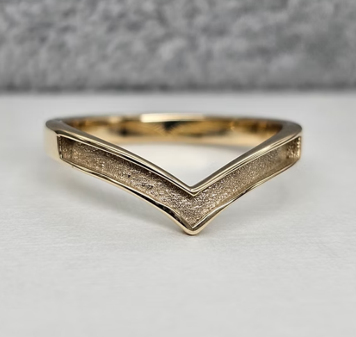 9ct yellow gold plain wishbone ring front-on view on white surface showing full V shape