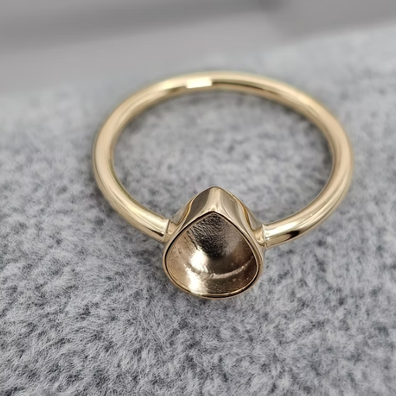 9ct yellow gold plain teardrop ring top-down view showing full ring and teardrop bezel shape