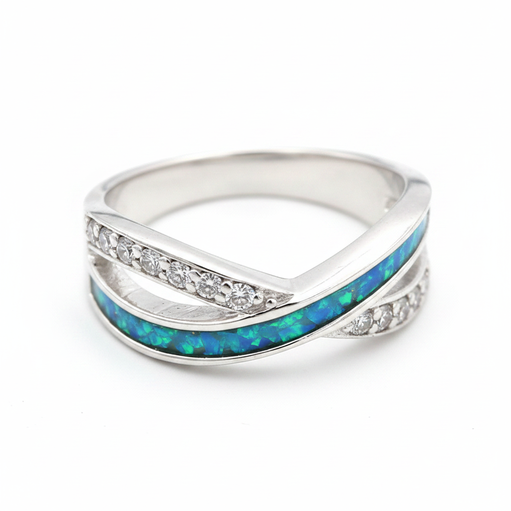 Infinity wave CZ 925 silver ring with blue teal opal resin top angled view on white background