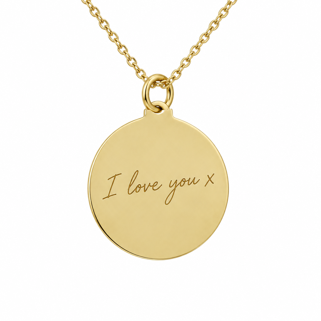 Round plain 9ct yellow gold disc pendant on fine gold chain with illustrative handwriting engraving on white background