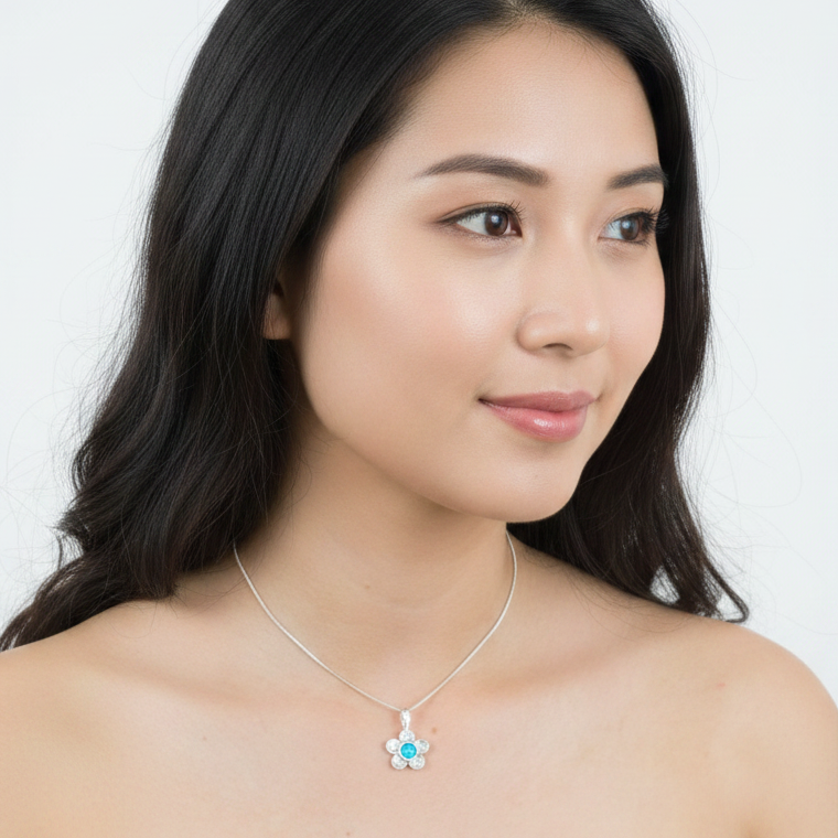 Model wearing daisy pendant