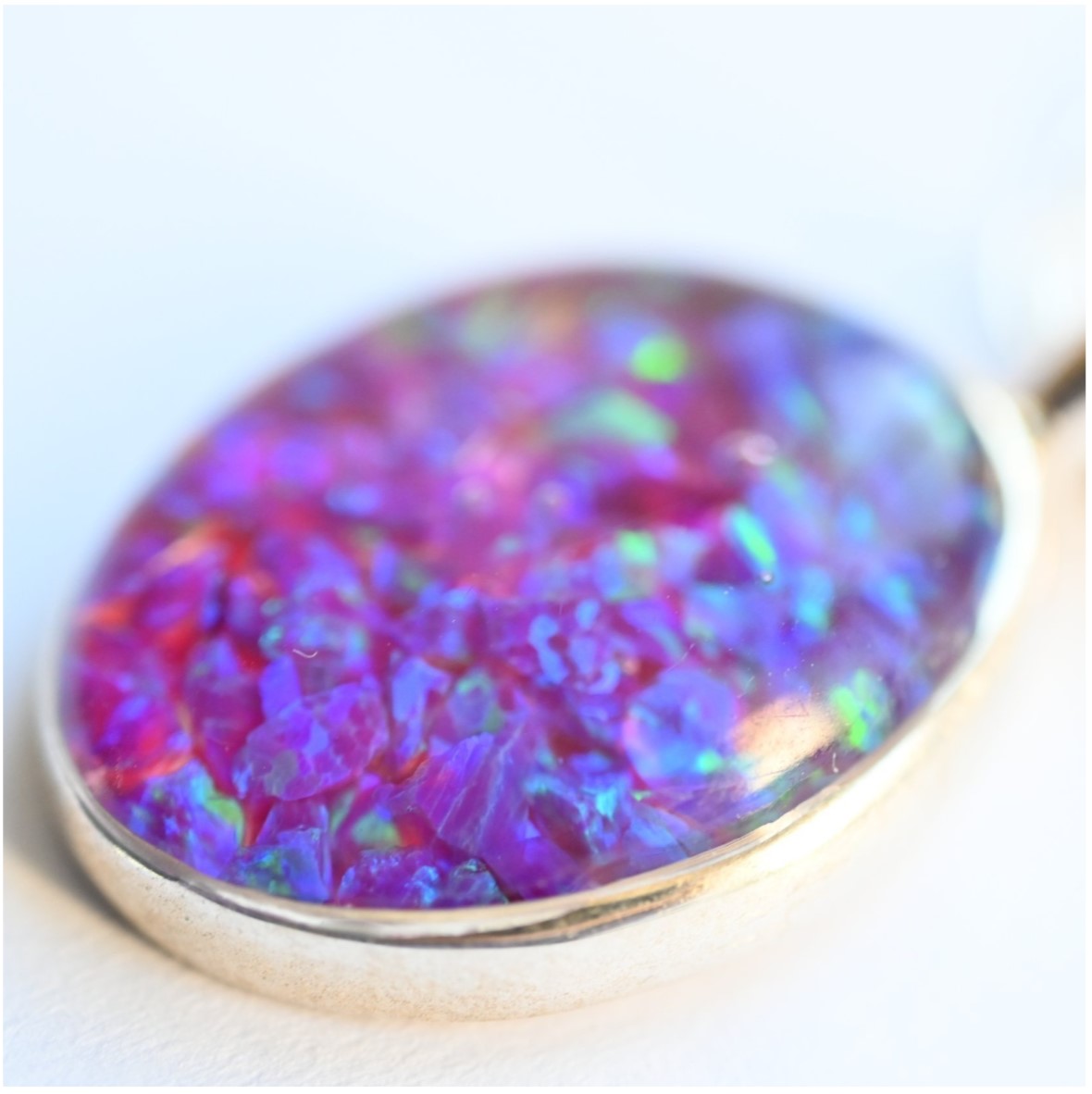 Personalised Memorial Opal Flake Oval Pendant with Silver Chain – A custom oval pendant containing opal flakes, suspended on a sterling silver chain for a timeless memorial keepsake.