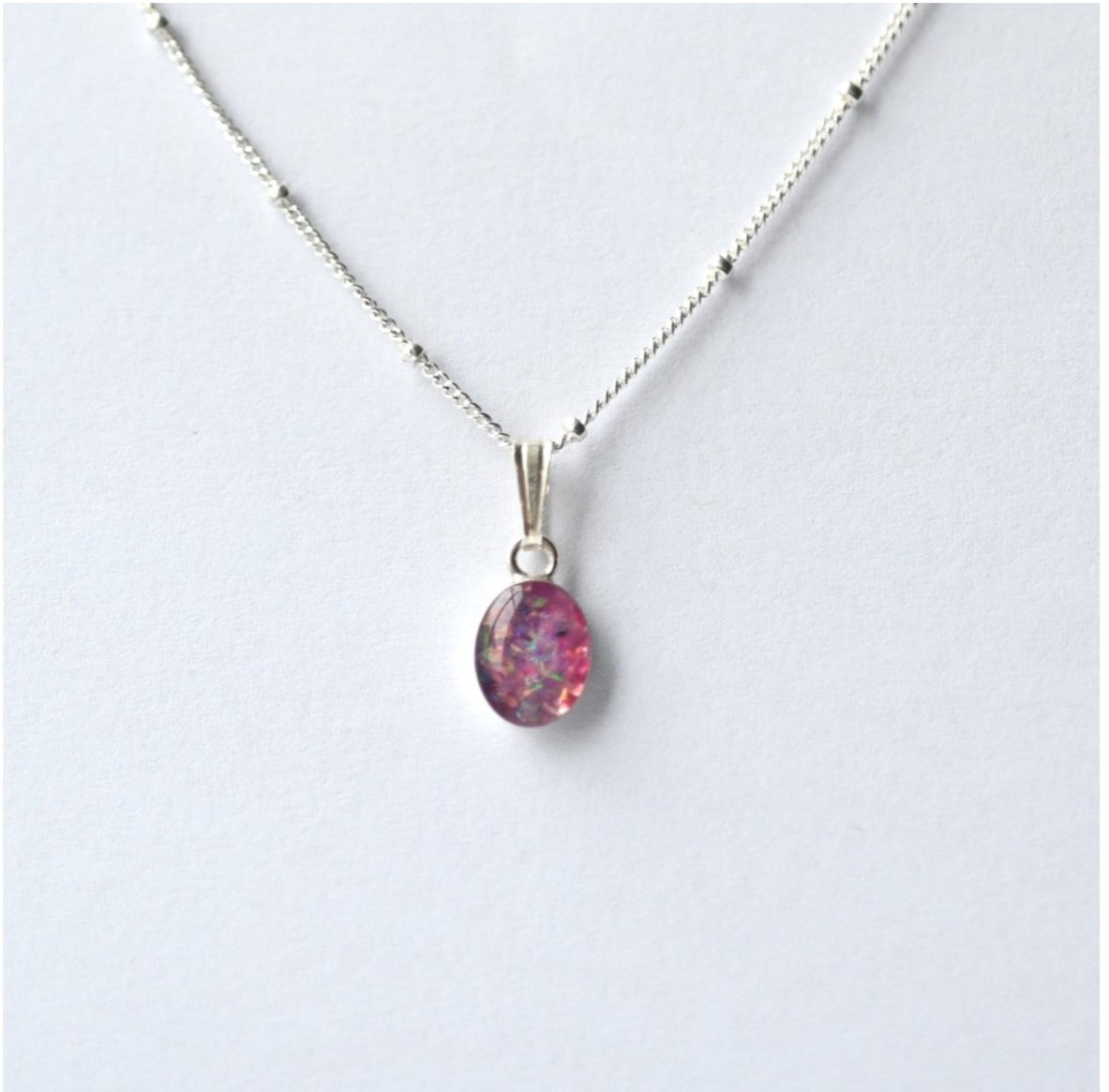 Minimalist 8mm x 6mm Memorial Pendant with Ashes or Hair – A simple and elegant custom keepsake pendant designed to hold a loved one’s ashes or hair, crafted in sterling silver or gold-filled metal.