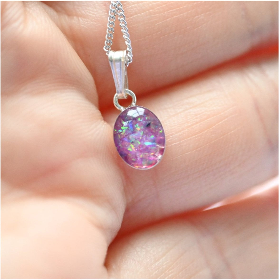 Close-up of Small Memorial Pendant (8mm x 6mm) in Sterling Silver – A delicate handcrafted pendant infused with ashes or hair, available in sterling silver or gold-filled options.