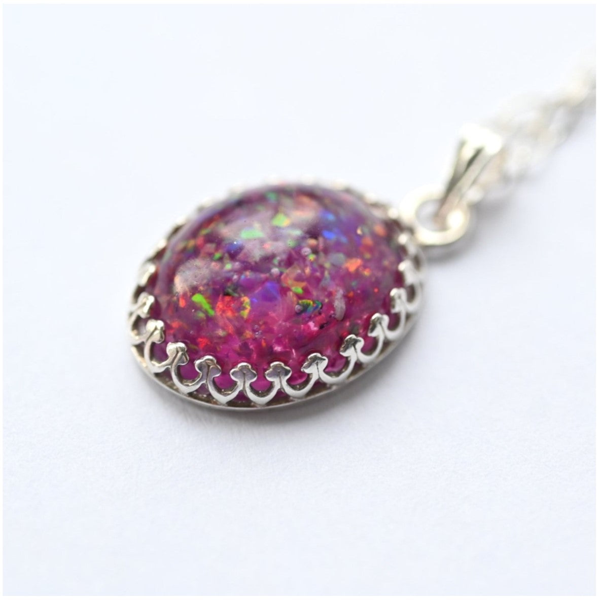 Close-up of Sterling Silver Necklace with 10x14mm Memorial Stone – A handcrafted sterling silver pendant featuring a 10x14mm stone with cremation ashes or opal flakes.