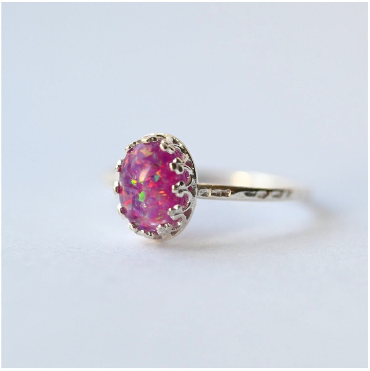 Side View of Sterling Silver Memorial Ring with 6x8mm Stone – A side angle showing the elegant design of the stacking ring, featuring a 6x8mm stone that holds cremation ashes.