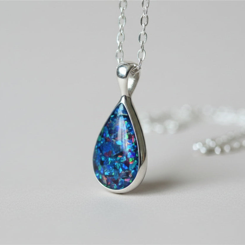 Side View of Teardrop Ashes Pendant in Sterling Silver – A detailed side angle of the teardrop necklace, highlighting its smooth finish and elegant memorial design.