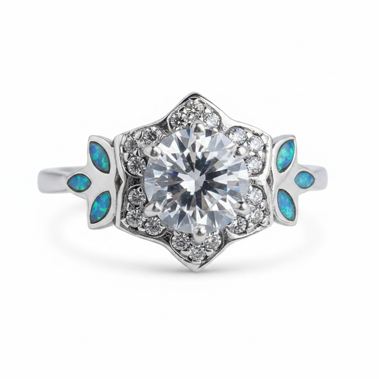 Vintage floral 925 silver CZ ring with blue teal opal resin in marquise butterfly wing settings on white background