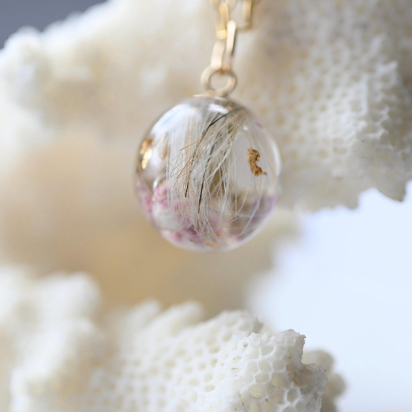 Handcrafted memorial sphere pendant with gold flakes and hair keepsake