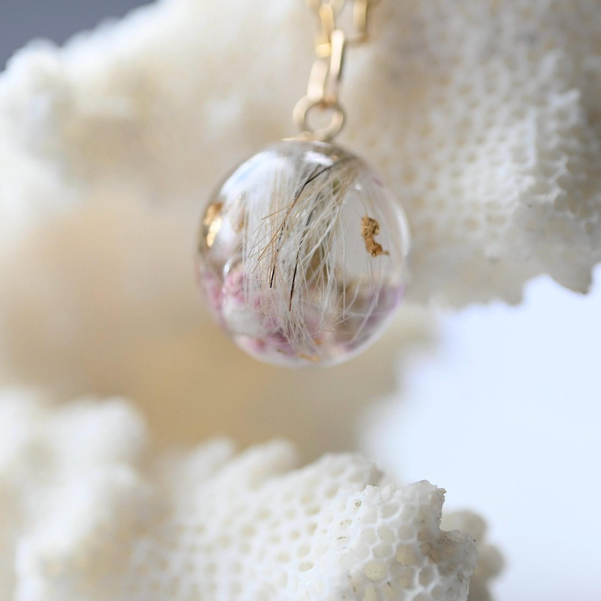 Handcrafted memorial sphere pendant with gold flakes and hair keepsake