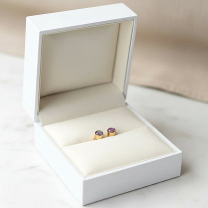 Elegant memorial jewellery – small gold-filled 4mm stud earrings with ashes and opal flakes, perfect for everyday wear.