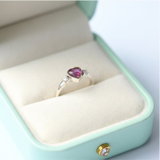 Elegant heart double gem ring with ashes, featuring a customisable design and sparkling gemstones, handcrafted in the UK as a meaningful memorial keepsake.