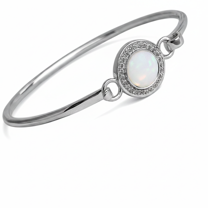 Halo CZ hook clasp silver bangle with white pearl opal resin in oval bezel, white background