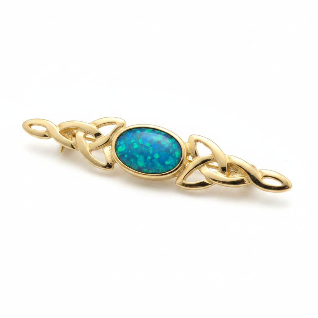 9ct gold Celtic trinity knot lapel brooch with blue teal opal resin in 7x5mm central setting on white background