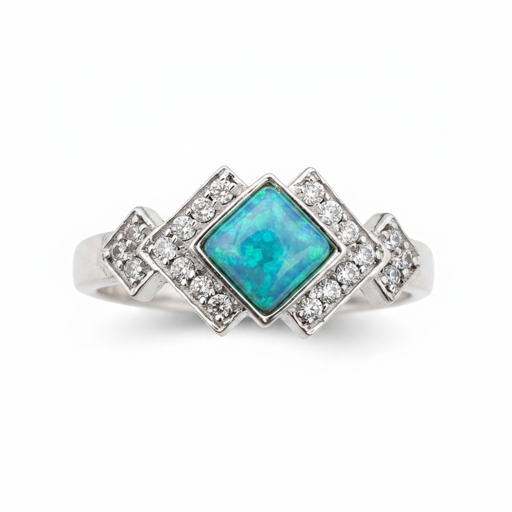 Art Deco CZ 925 silver ring with blue teal opal resin in diamond centre setting on white background