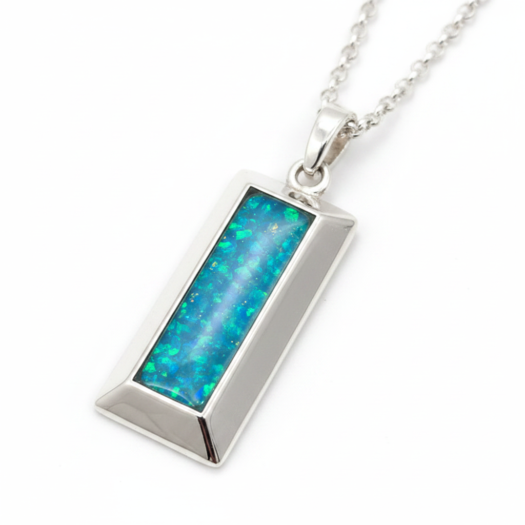 Gents 3D bullion bar silver pendant with blue teal opal resin in centre bezel, white background
