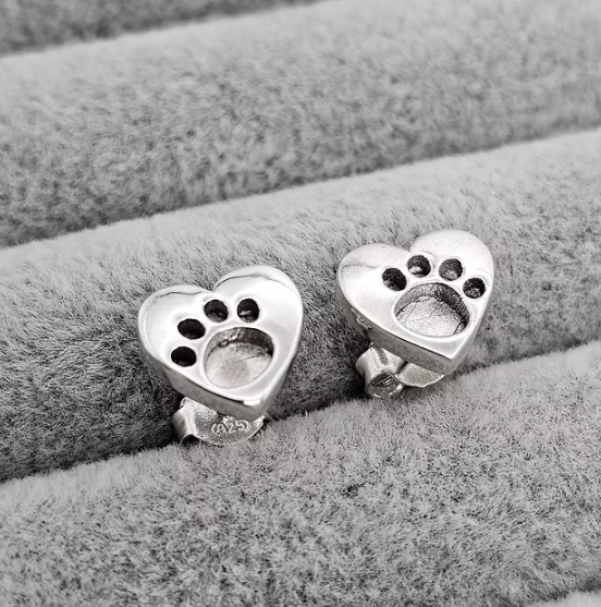 Silver 925 heart paw print stud earrings on grey velvet — blank silver