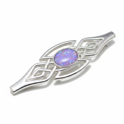 Silver 925 Celtic bar brooch with lavender purple opal resin in 8x6mm central setting on white background