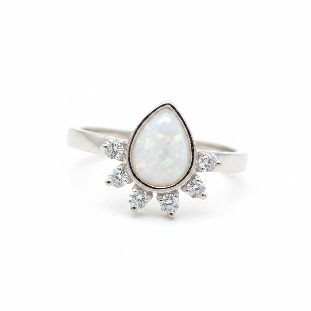 Rain drop CZ 925 silver ring with white pearl opal resin pear centre on white background