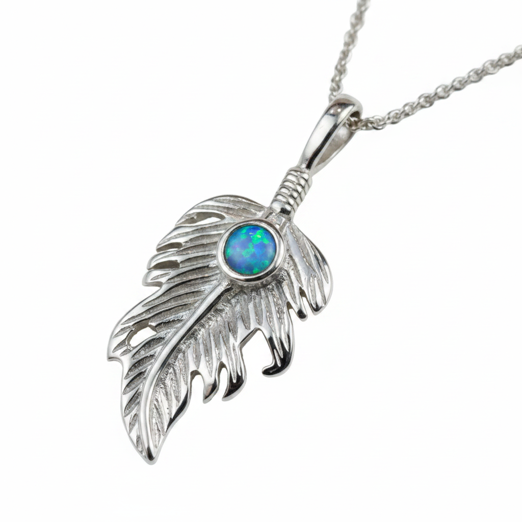 Silver 925 feather leaf memorial pendant with blue opal flakes, white background