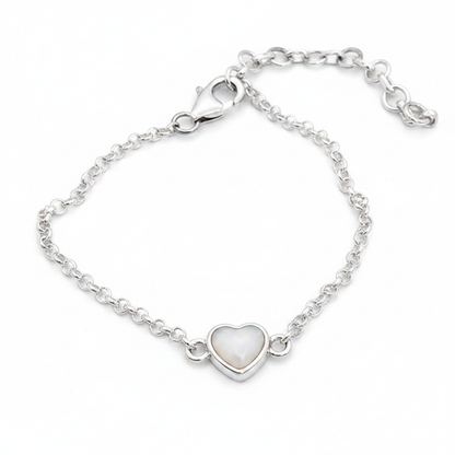 Mini heart charm silver bracelet with white pearl opal resin in heart bezel, white background