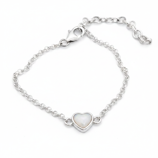 Mini heart charm silver bracelet with white pearl opal resin in heart bezel, white background