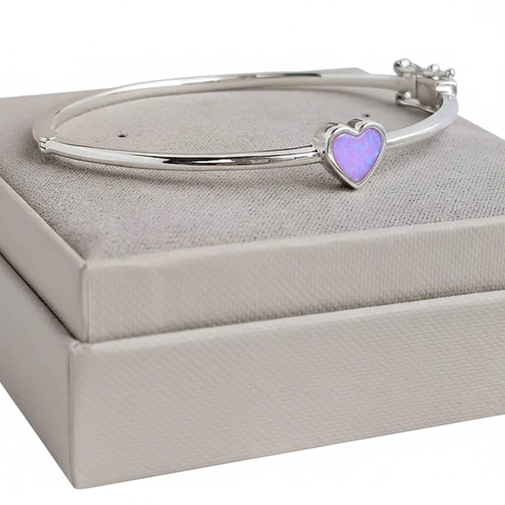 Bubble heart silver bangle with lavender purple opal resin in heart bezel, white background