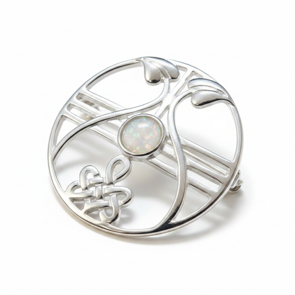 Silver 925 Celtic round open-work brooch with white pearl opal resin in 6mm central setting on white background