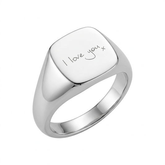 Illustrative mirror-polished 10mm cushion silver signet ring with I love you x handwriting engraving