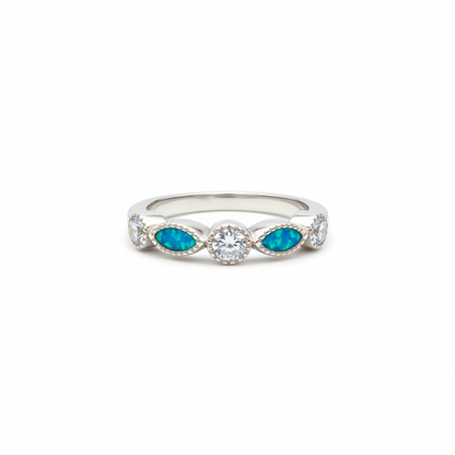 925 sterling silver CZ marquise half band memorial ring with blue teal opal resin in marquise bezels on white background