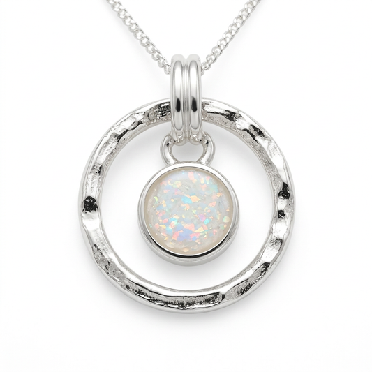 Illustrative hammered-circle memorial necklace with pearl mica and white opal flakes