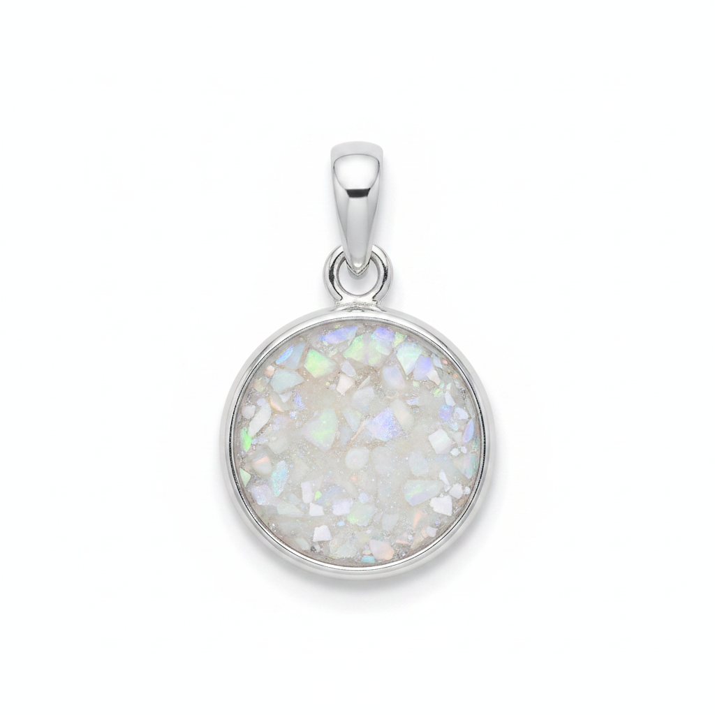 Plain edge silver round memorial pendant with white pearl opal and mica inclusion, white background