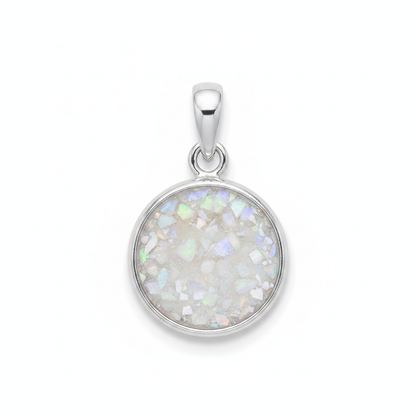 Plain edge silver round memorial pendant with white pearl opal and mica inclusion, white background