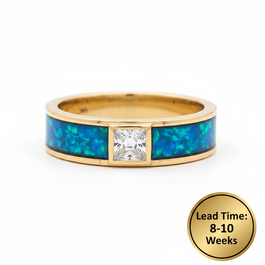 9ct yellow gold 6mm front face CZ memorial ring with blue teal opal resin channels, white background, lead time 8-10 weeks