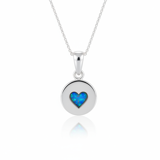 Silver 925 heart disc memorial pendant with blue opal resin on chain, white background