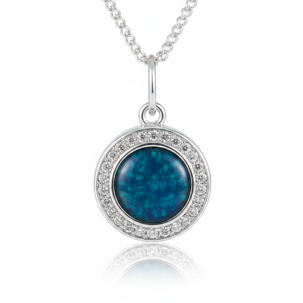 Silver 925 CZ halo round locket — blue teal opal flakes resin in 8mm round setting, sparkling CZ halo border, pure white background
