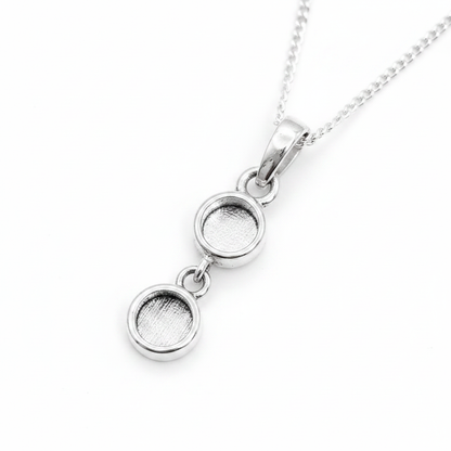 Two Round Bezel 925 Silver Memorial Pendant — plain silver on white background
