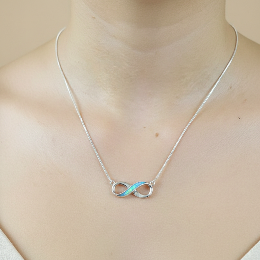 Silver 925 infinity memorial pendant worn on model — lifestyle shot showing true scale on 18 inch chain